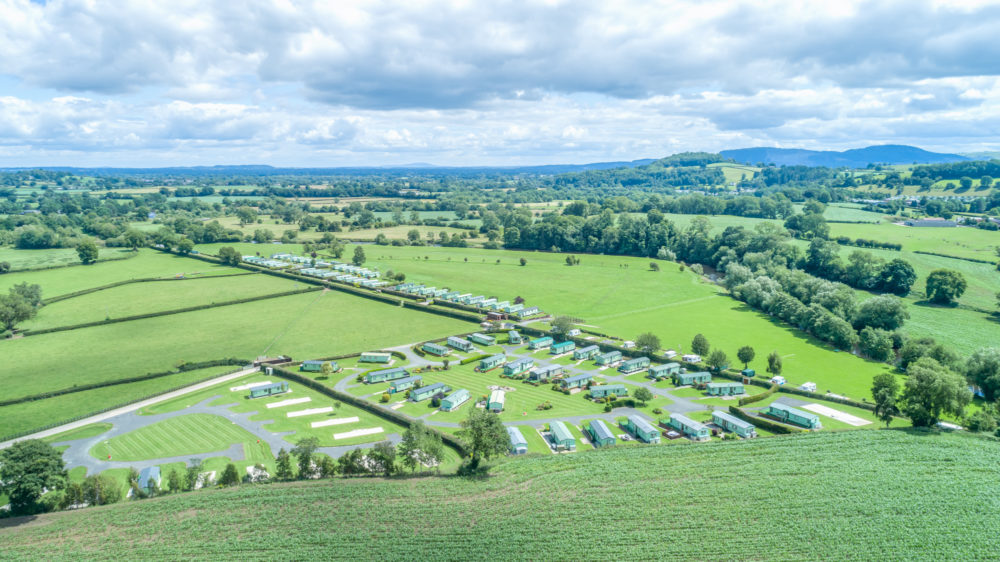 An aerial view of Bryn Vyrnwy Caravan Park and the Welsh hills