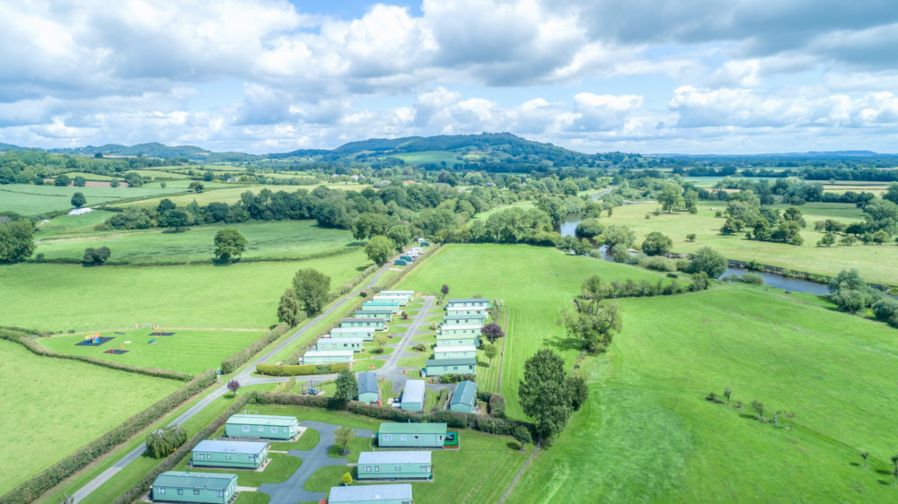 Drone footage of the Caravan Parks surrounded by Welsh green fields